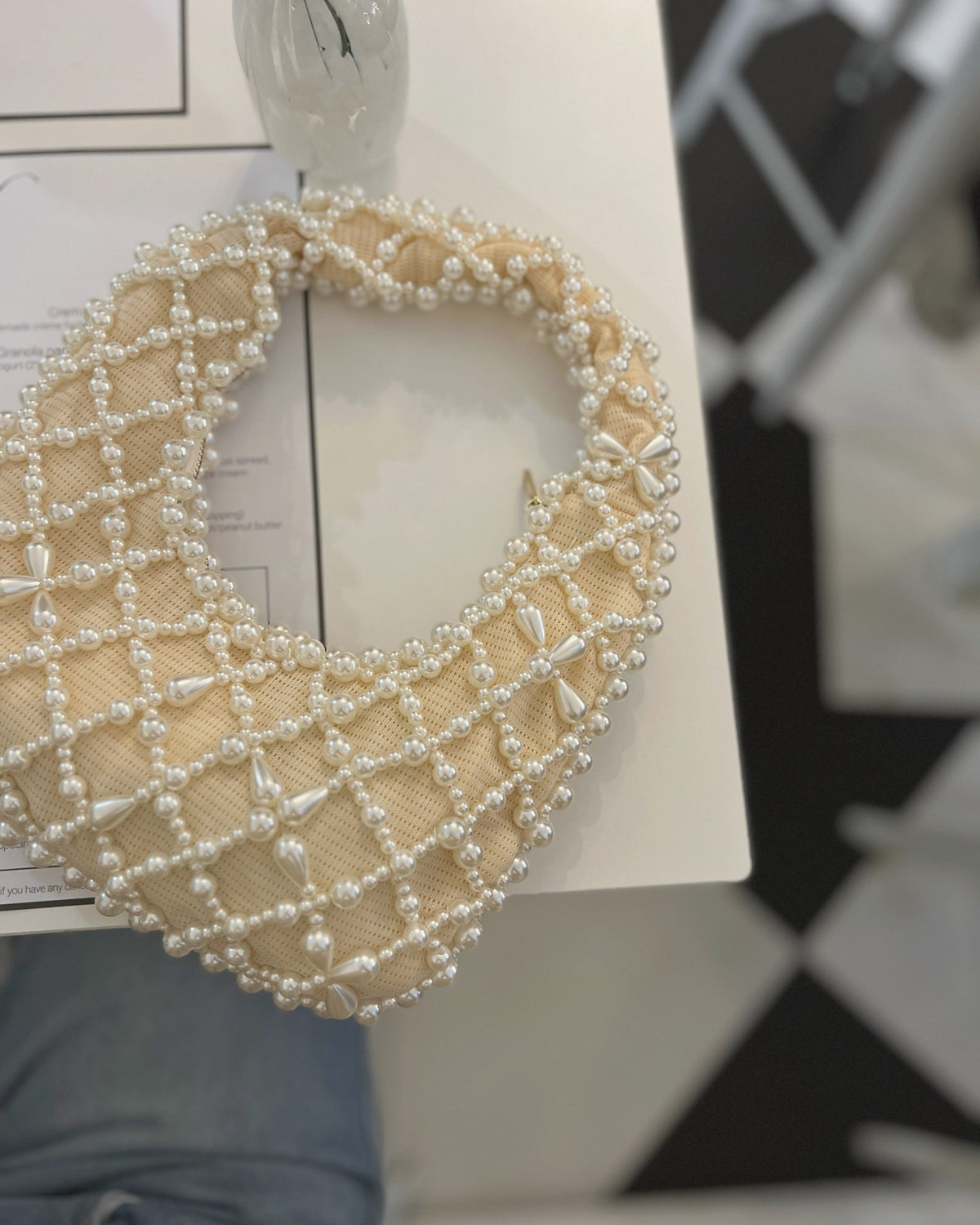 Kate – faux pearl clutch bag, lifestyle shot