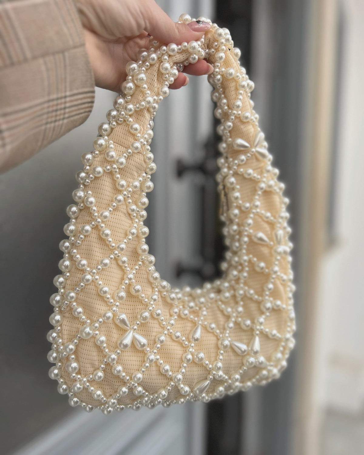 Kate – faux pearl clutch bag, lifestyle shot