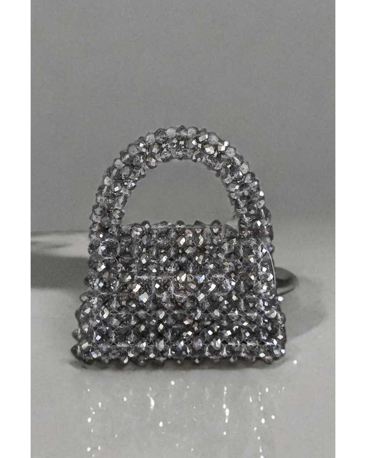 Nyx – glass crystal clutch bag, studio shot