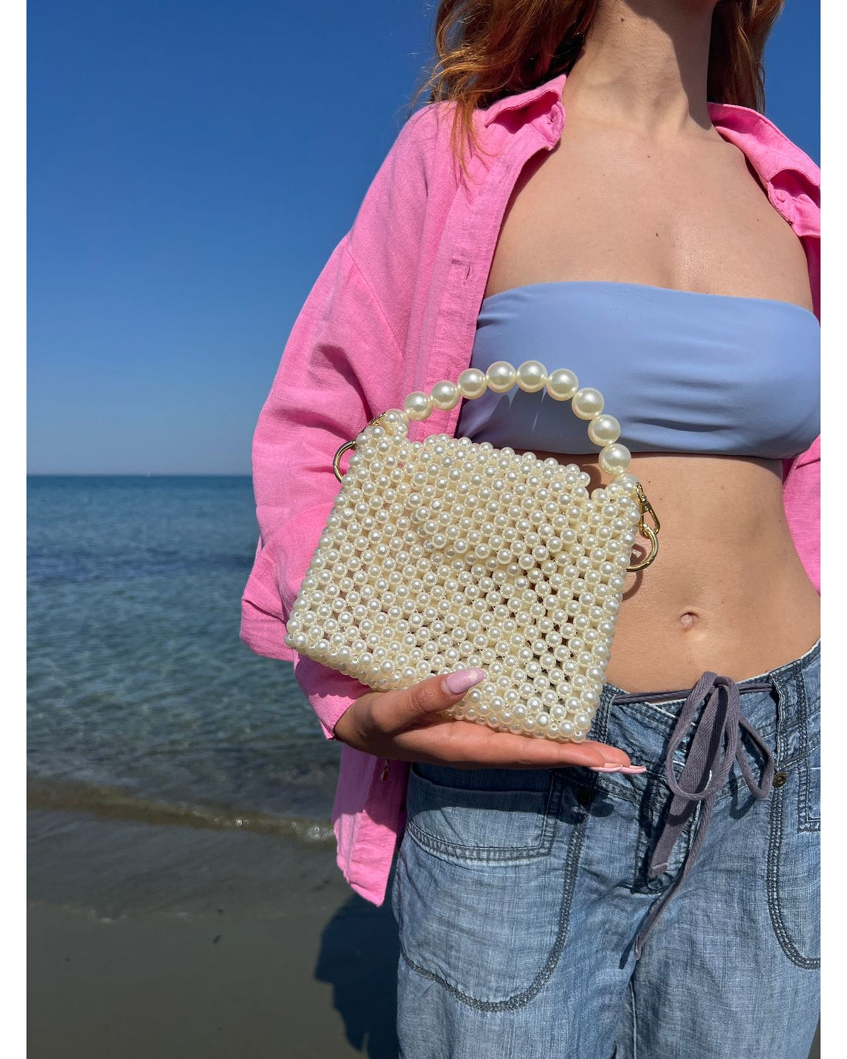 Ophelia – faux pearl clutch bag, lifestyle shot