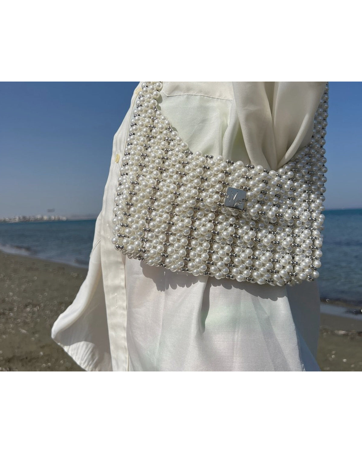 Velora – faux pearl shoulder bag worn on the shoulder, lifestyle shot